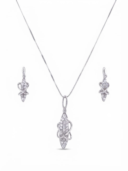 Silver-tone jewelry set featuring a pendant necklace, matching drop earrings, and a rectangular chain, all adorned with clear pavé stones on a white background.