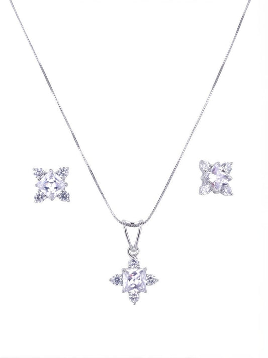 Silver-tone jewelry set featuring a delicate chain necklace with a starburst pendant, matching stud earrings, and clear gemstones on a plain white background.