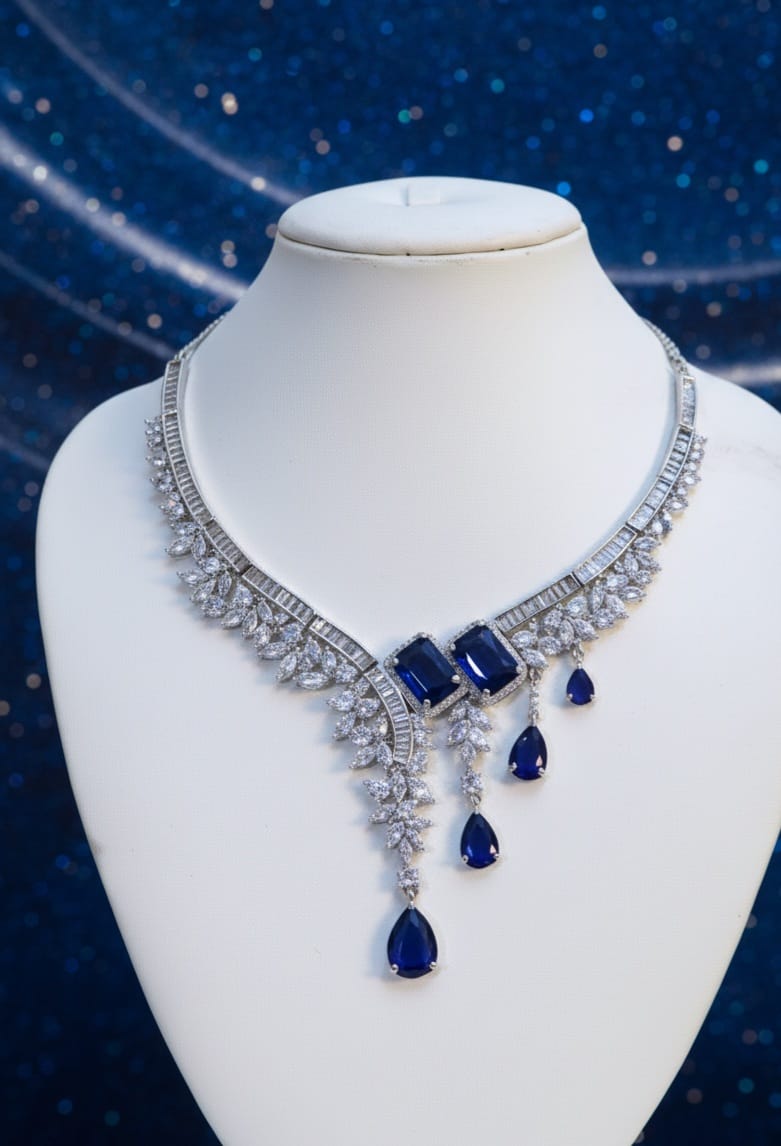 Elegant necklace with blue gemstones on a mannequin against a starry night sky background